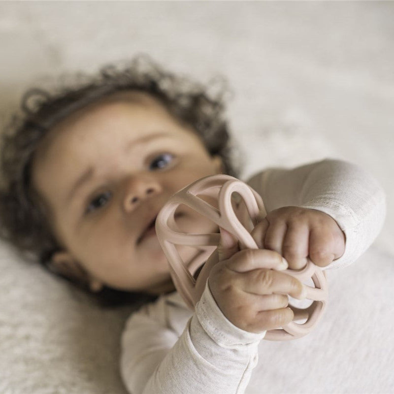 Pelota sensorial silicona rosa - Little Dutch