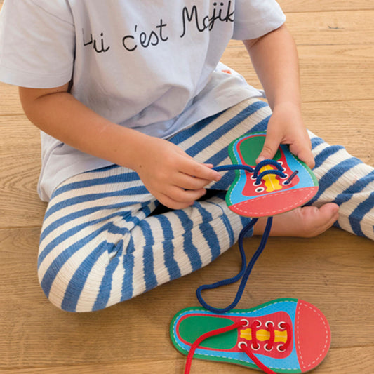 Juego ata los zapatos - Apli